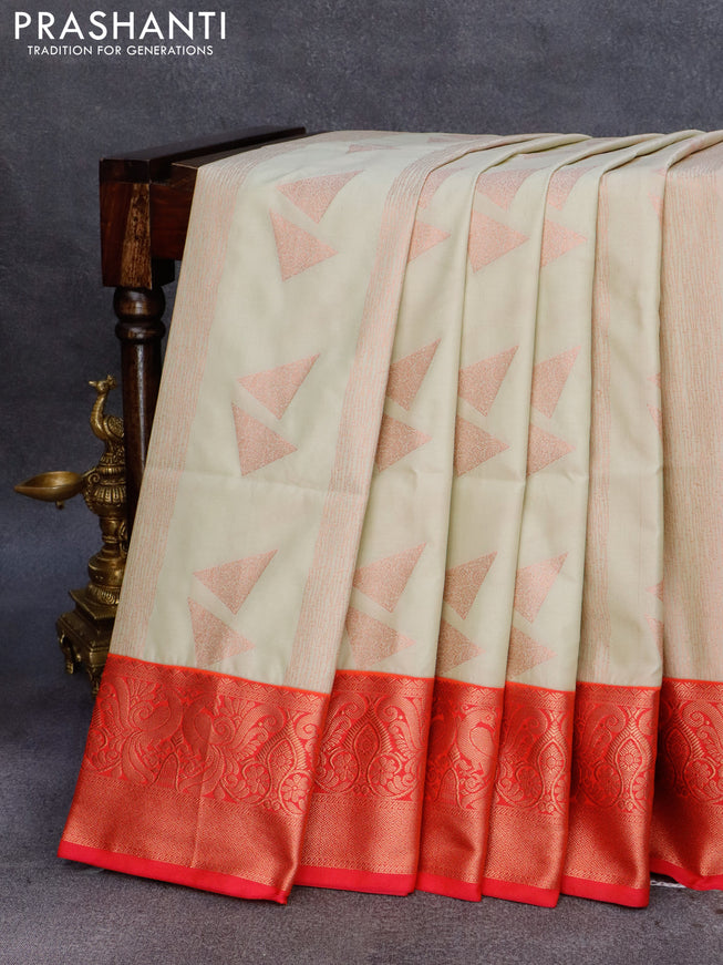 Semi soft silk saree cream and dual shade of pinkish orange with allover copper zari weaves & geometric buttas and rich peacock zari woven border