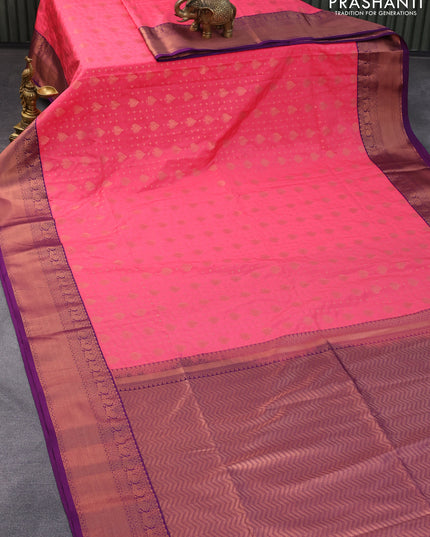 Semi soft silk saree peach pink and purple with allover zari woven buttas and copper zari woven border