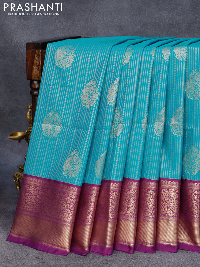 Semi soft silk saree blue and purple with allover zari weaves and zari woven border
