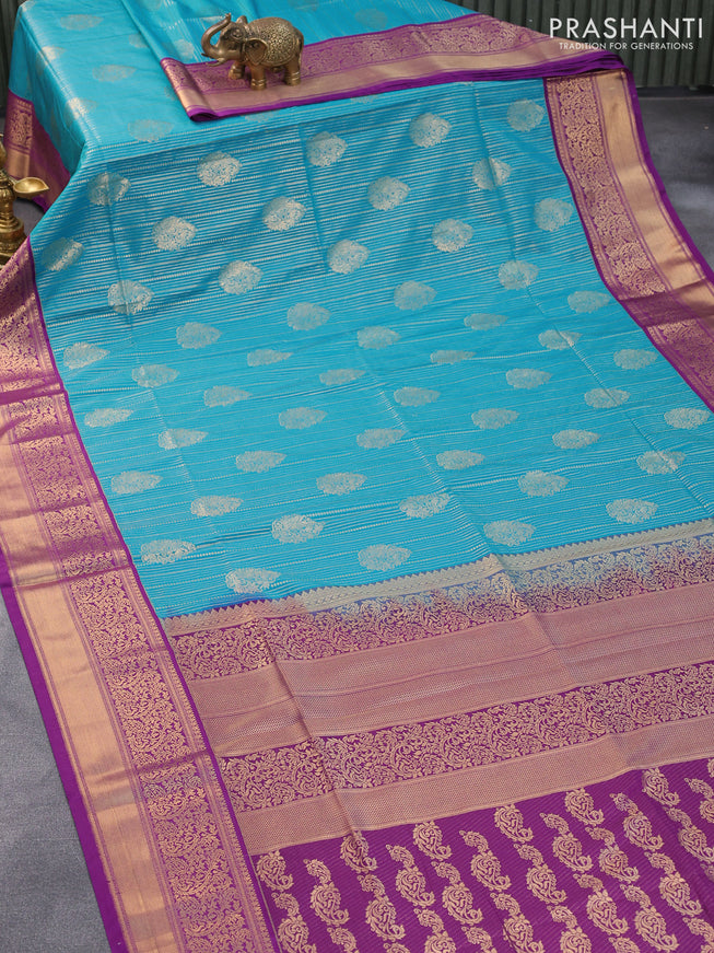 Semi soft silk saree blue and purple with allover zari weaves and zari woven border
