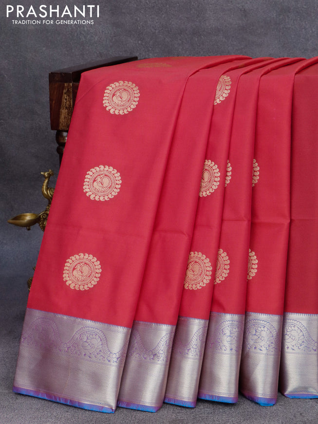 Semi soft silk saree reddish pink and cs blue with annam zari woven buttas and zari woven border