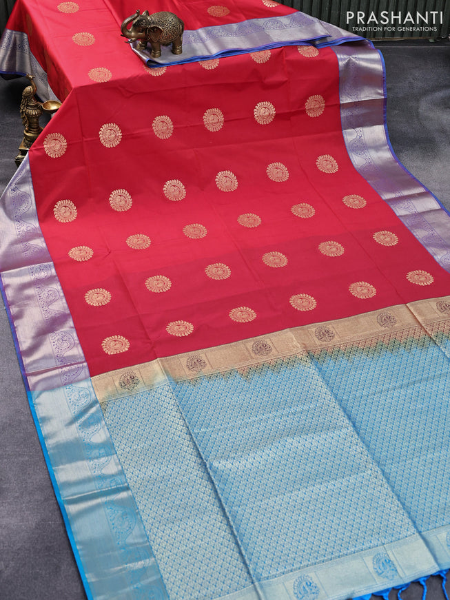 Semi soft silk saree reddish pink and cs blue with annam zari woven buttas and zari woven border