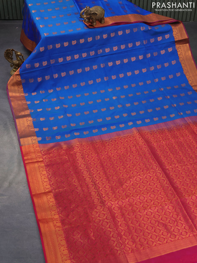 Semi soft silk saree dual shade of blue and pink with copper zari woven paisley buttas and zari woven annam border