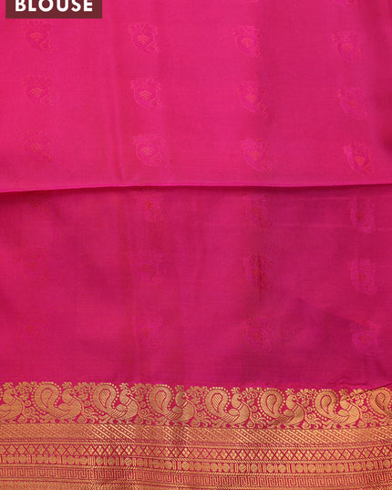 Semi soft silk saree dual shade of blue and pink with copper zari woven paisley buttas and zari woven annam border