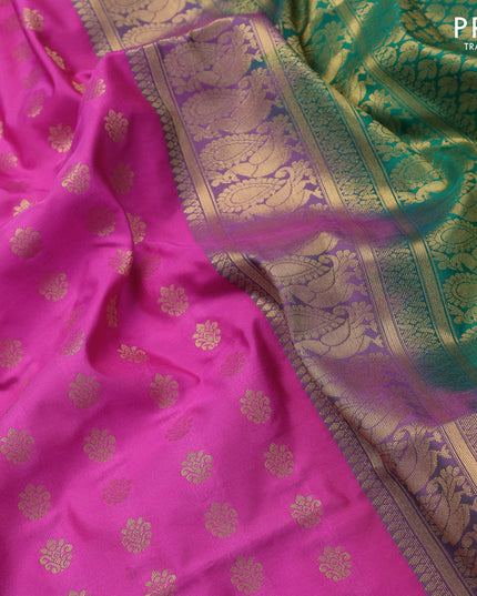 Semi soft silk saree pink and green with allover zari woven buttas and zari woven annam border