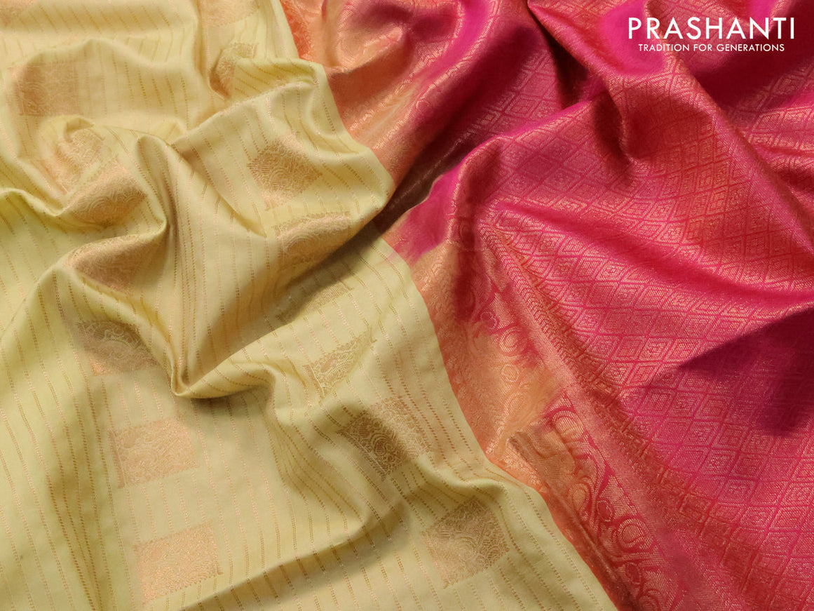 Semi soft silk saree pale yellow shade and pink with allover zari stripes & buttas and copper zari woven border