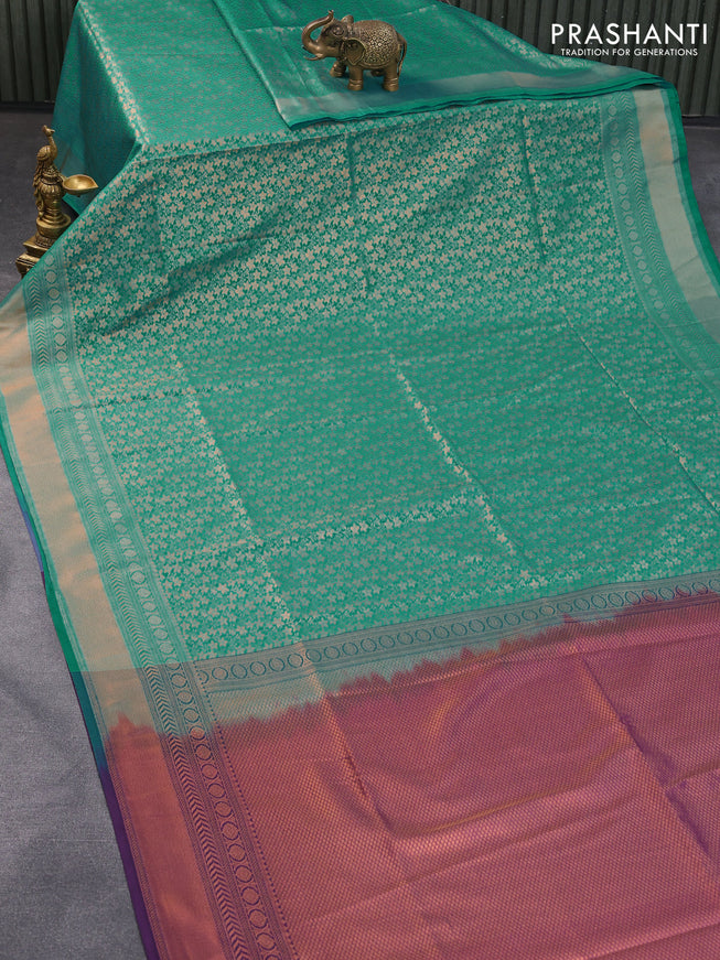 Semi soft silk saree teal blue and violet with allover copper zari woven brocade weaves and copper zari woven border