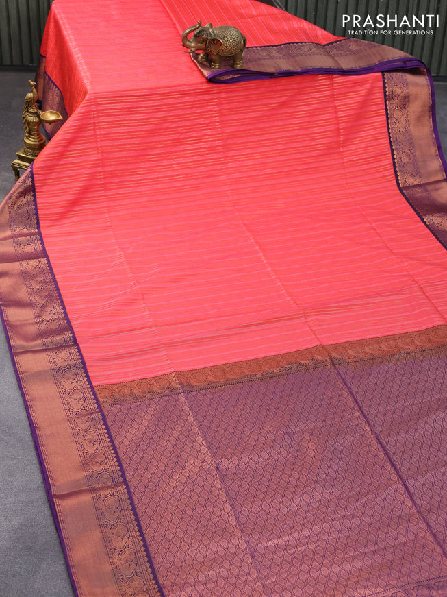 Semi soft silk saree dual shade of pinkish orange and deep violet with allover zari weaves and copper zari woven border