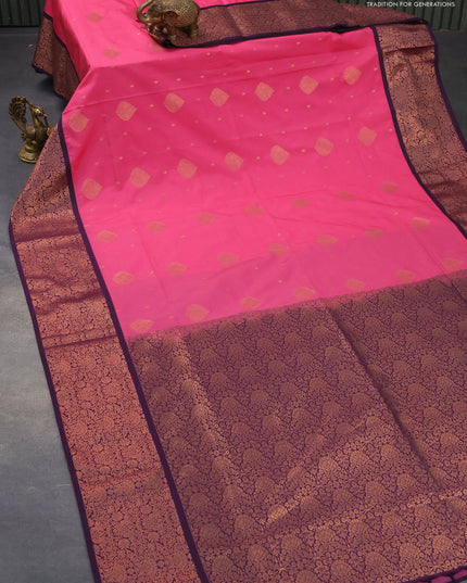 Semi soft silk saree light pink and deep violet with allover zari woven butta weaves and copper zari woven border