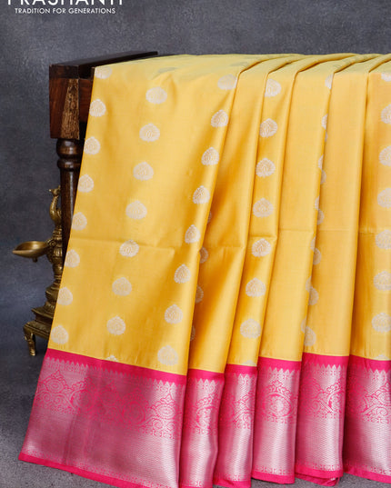 Semi soft silk saree yellow and pink with allover silver zari woven buttas and zari woven border