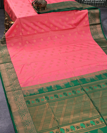 Semi soft silk saree peach pink and green with allover copper zari stripes & buttas and copper zari woven border