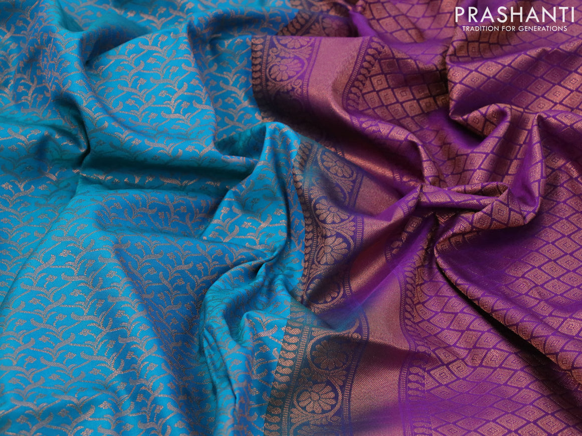 Semi soft silk saree cs blue and purple with allover copper zari woven brocade weaves and copper zari woven border