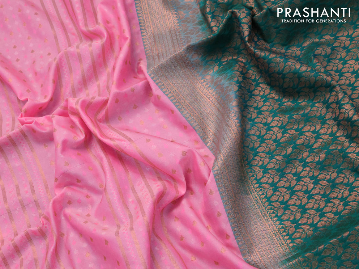 Semi soft silk saree candy pink and peacock green with allover self emboss & zari weaves and rich copper zari woven border