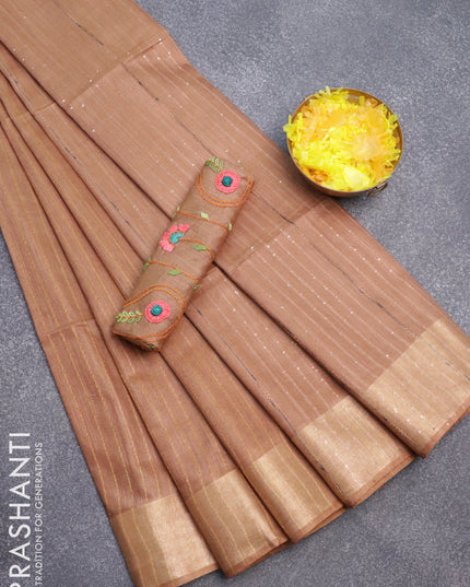 Semi tussar saree dark sandal with allover zari weaves and zari woven border & embroidery work blouse