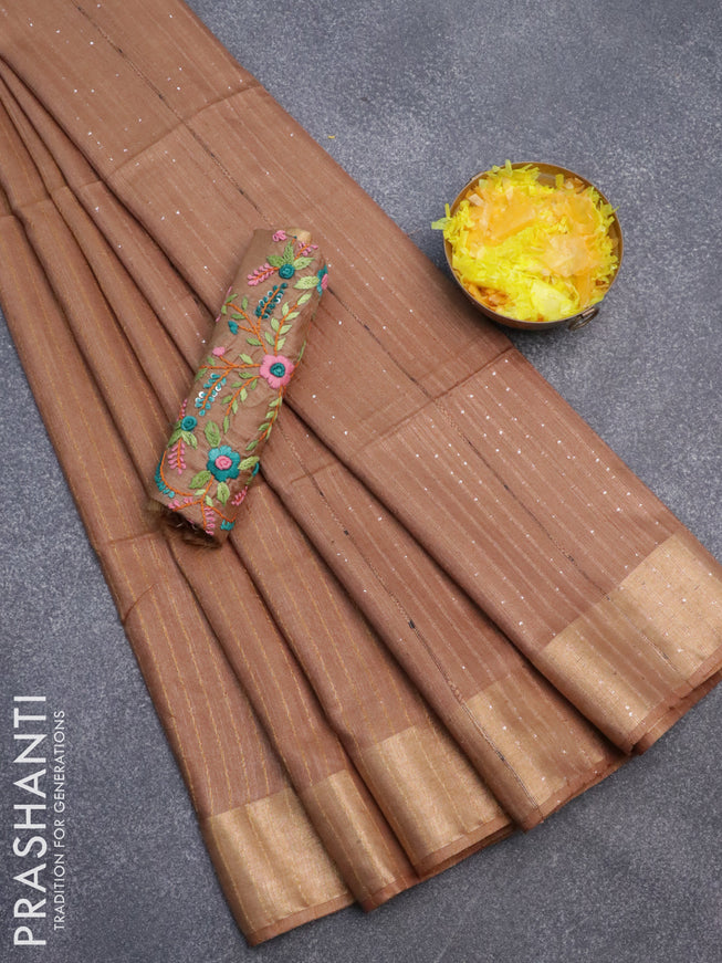 Semi tussar saree dark sandal with allover zari woven stripes pattern and sequin work pallu & embroidery work blouse
