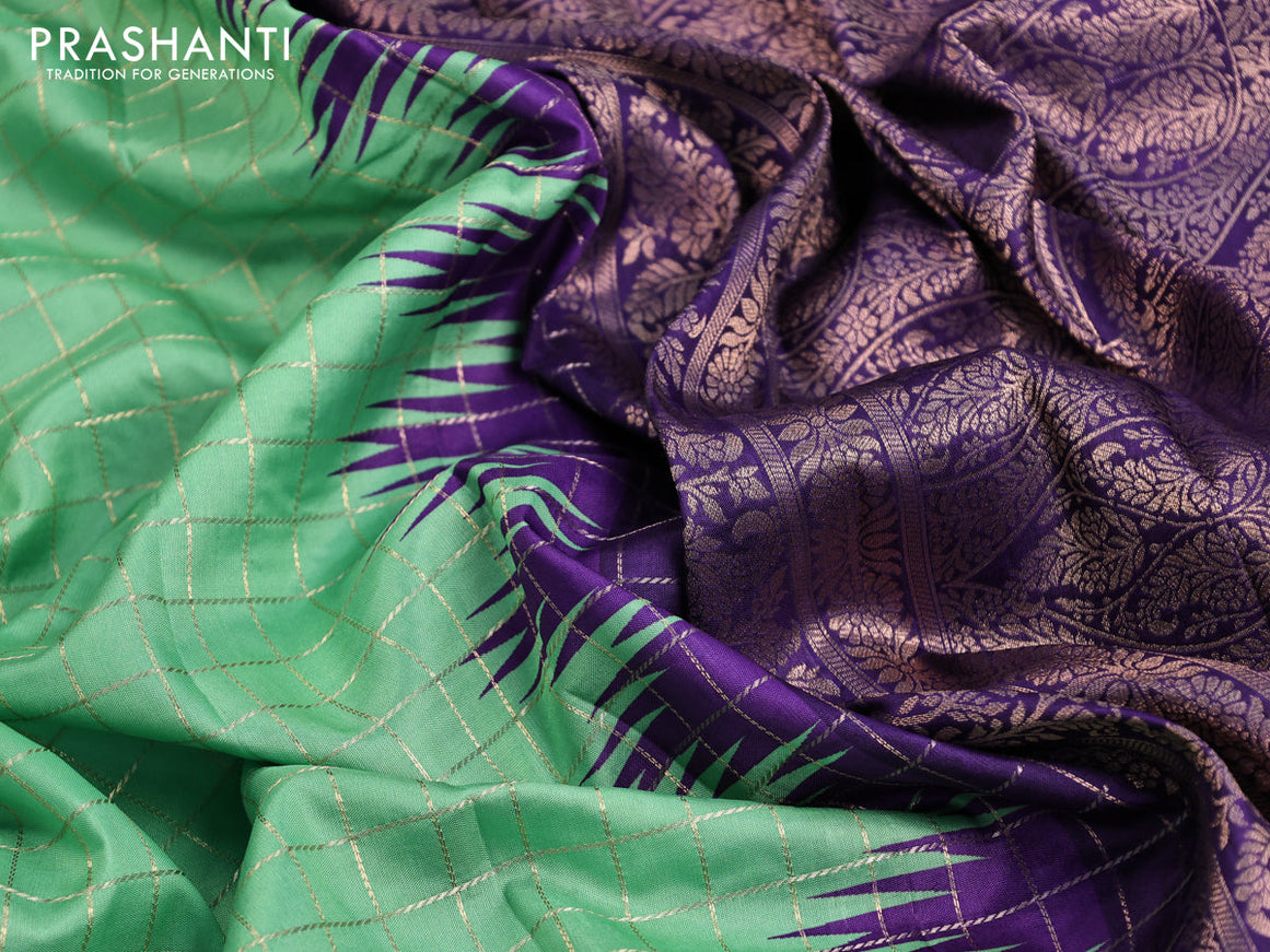 Semi raw silk saree teal green and violet with allover zari checked pattern and temple design copper zari woven border