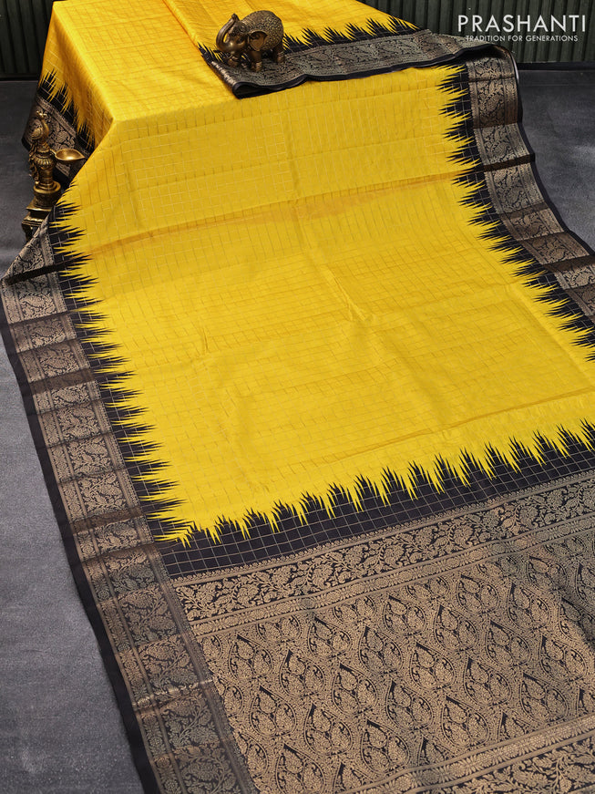 Semi raw silk saree yellow and black with allover zari checked pattern and temple design copper zari woven border