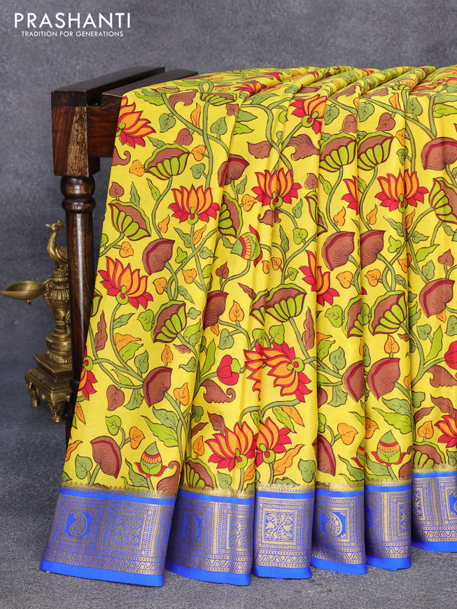 Printed crepe silk saree lime yellow and blue with allover kalamkari prints and zari woven border