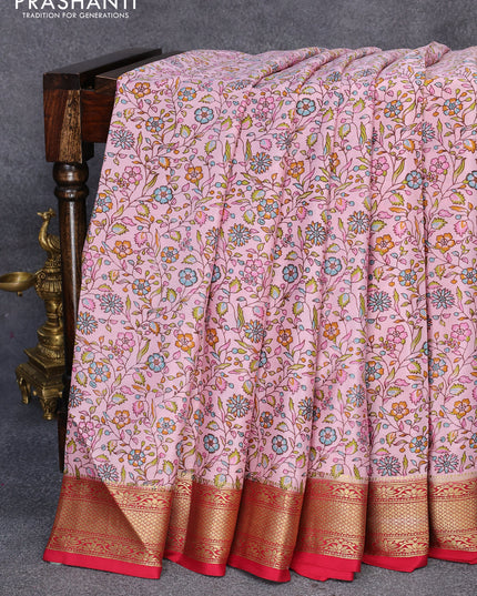 Printed crepe silk saree pastel pink and maroon with allover floral prints and zari woven border