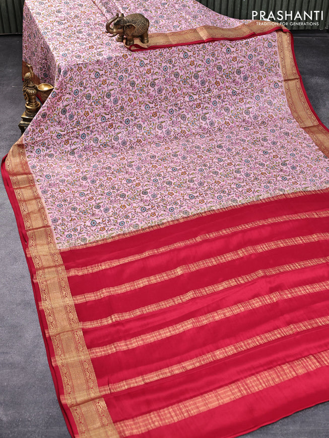 Printed crepe silk saree pastel pink and maroon with allover floral prints and zari woven border