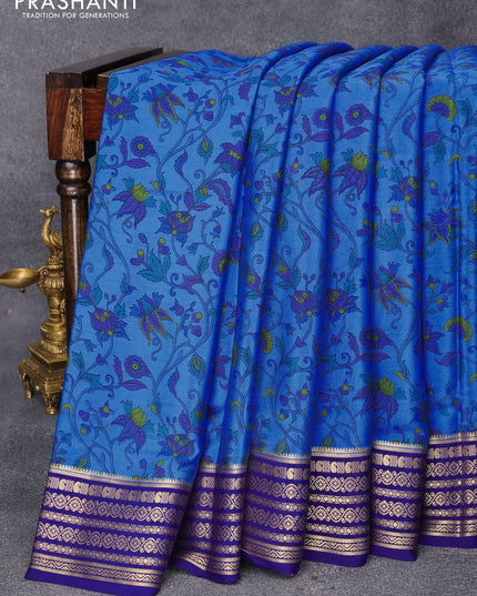 Printed crepe silk saree blue and dark blue with allover floral prints and zari woven border