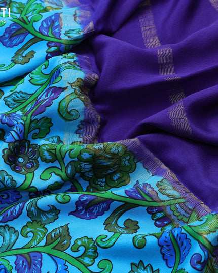 Printed crepe silk saree cs blue and blue with allover kalamkari prints and rich zari woven border