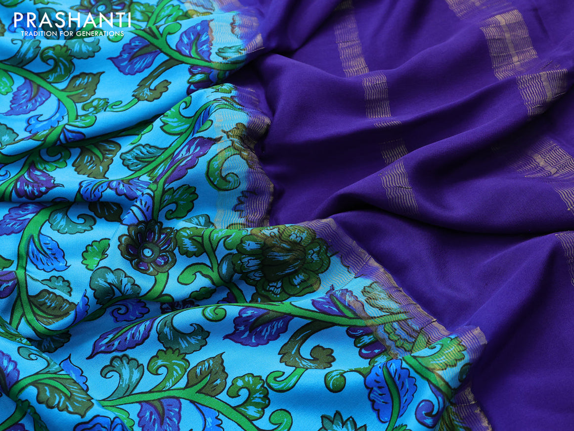 Printed crepe silk saree cs blue and blue with allover kalamkari prints and rich zari woven border
