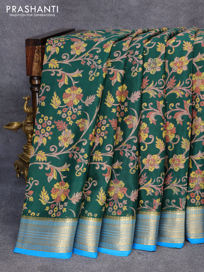 Printed crepe silk saree dark green and cs blue with allover floral prints and zari woven border
