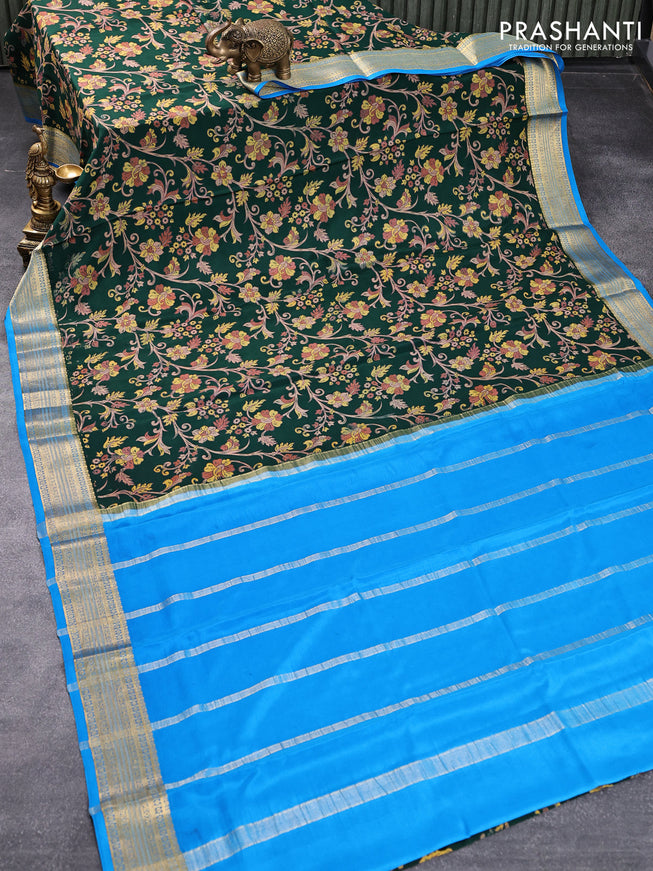 Printed crepe silk saree dark green and cs blue with allover floral prints and zari woven border