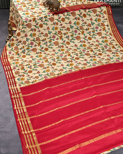 Printed crepe silk saree cream and red with allover floral prints and zari woven border