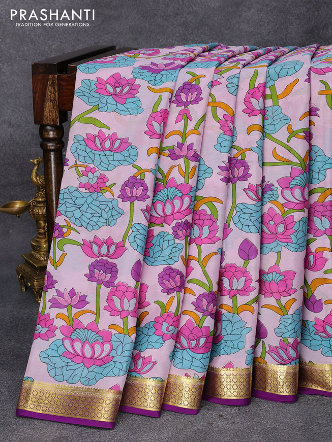 Printed crepe silk saree pastel pink and violet with allover floral prints and zari woven border