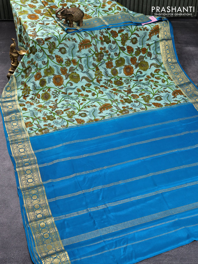 Printed crepe silk saree teal shade and cs blue with allover kalamkari prints and zari woven border