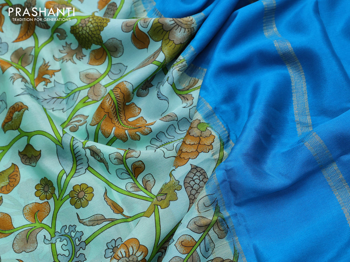 Printed crepe silk saree teal shade and cs blue with allover kalamkari prints and zari woven border