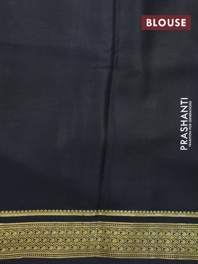 Printed crepe silk saree blue and black with allover kalamkari prints and zari woven border