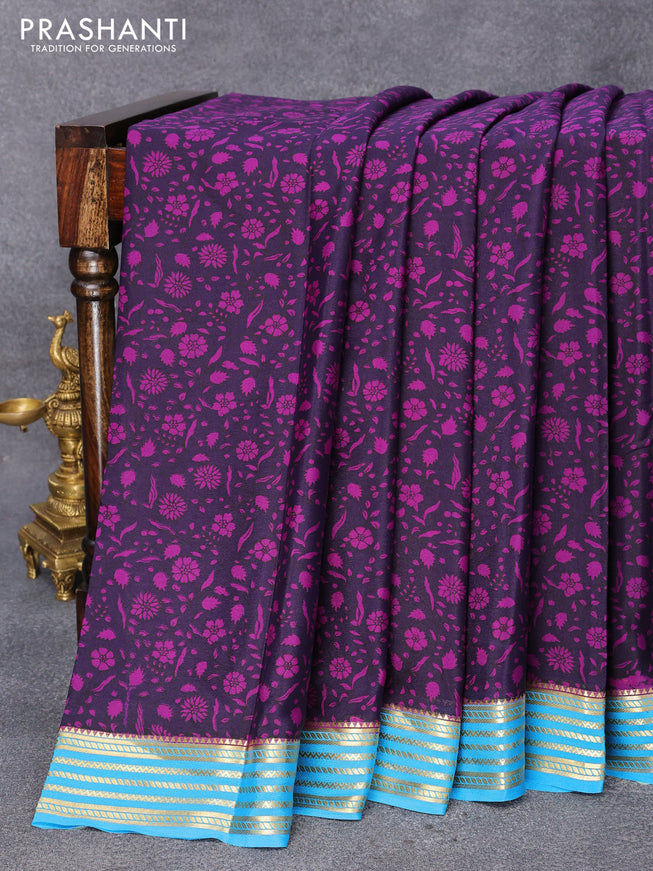 Printed crepe silk saree deep jamun and blue with allover floral prints and zari woven border