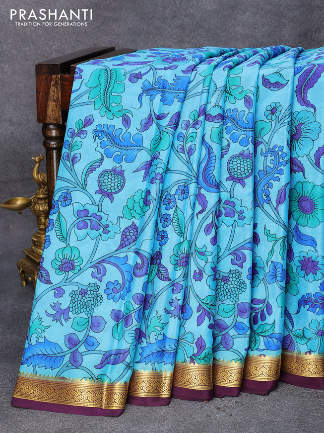 Printed crepe silk saree light blue and wine shade with allover kalamkari prints and zari woven border
