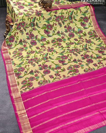 Printed crepe silk saree lime yellow and pink with allover kalamkari prints and zari woven border