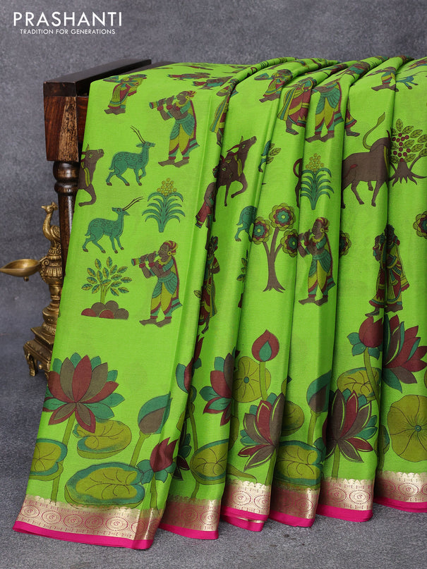 Printed crepe silk saree green and magenta pink with allover butta prints and zari woven border