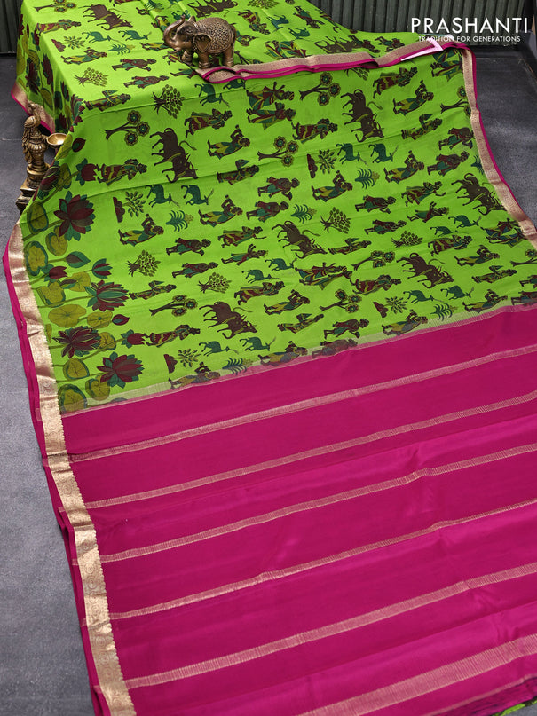 Printed crepe silk saree green and magenta pink with allover butta prints and zari woven border