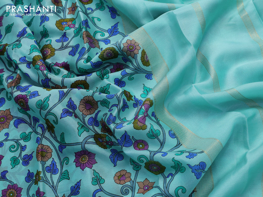 Printed crepe silk saree teal blue and blue with allover kalamkari prints and small zari woven border
