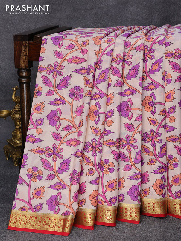 Printed crepe silk saree pastel peach shade and red with allover prints and zari woen border