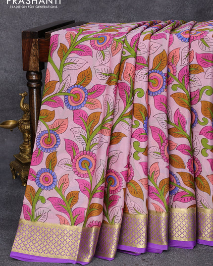 Printed crepe silk saree pastel pink and levender with allover kalamkari prints and zari woven border