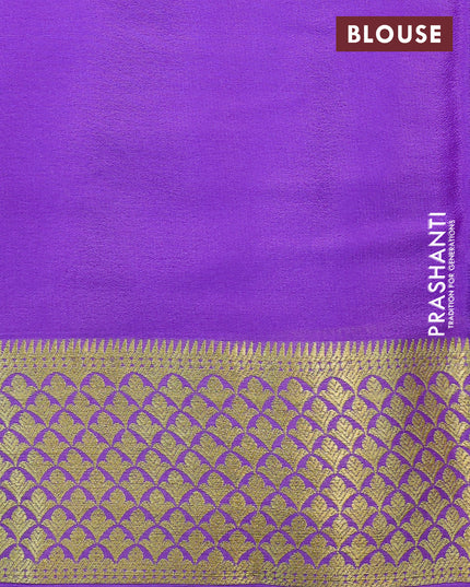 Printed crepe silk saree pastel pink and levender with allover kalamkari prints and zari woven border