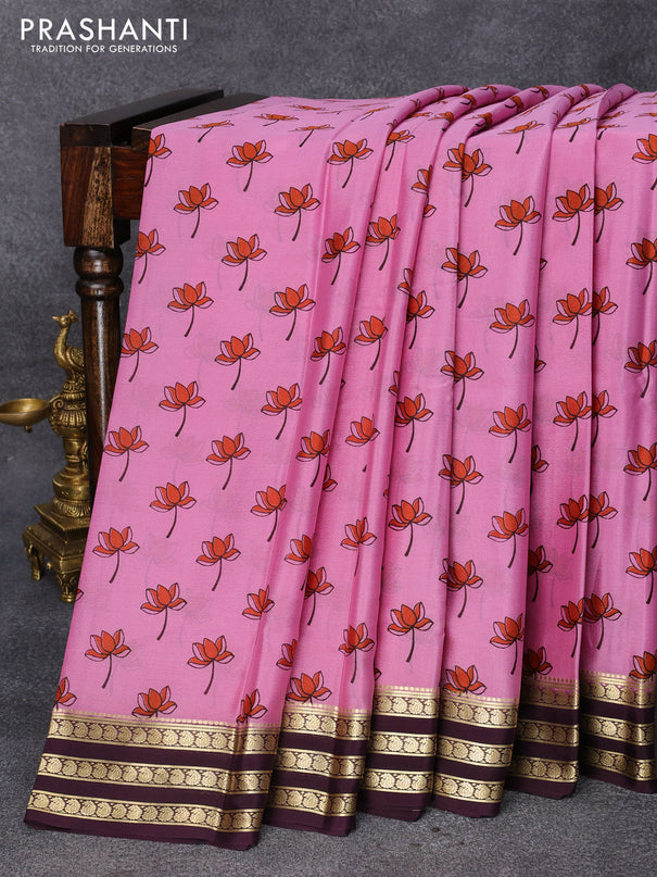 Printed crepe silk saree mauve pink and wine shade with allover floral butta prints and zari woven border