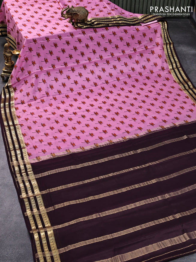 Printed crepe silk saree mauve pink and wine shade with allover floral butta prints and zari woven border