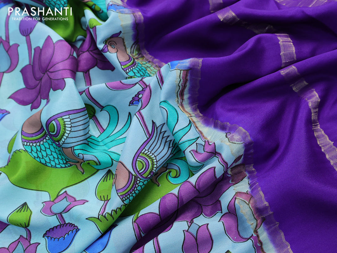 Printed crepe silk saree light blue and violet with allover kalamkari prints and zari woven border