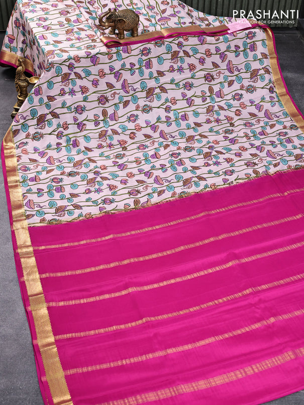 Printed crepe silk saree pastel pink and pink with allover pichwai prints and zari woven border
