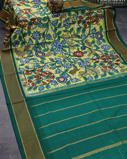 Pure kanjivaram silk saree fluorescent green and green with allover pen kalamkari prints and temple design rettapet zari woven border