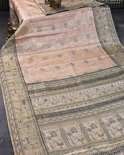 Tissue semi kanjivaram silk saree peach shade and black with allover zari woven brocade weaves and long zari woven border