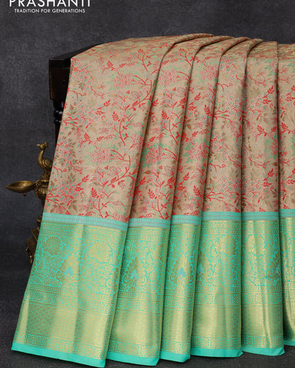 Tissue semi kanjivaram silk saree dual shade of red and teal green with allover thread & zari woven floral brocade weaves and long floral zari woven border